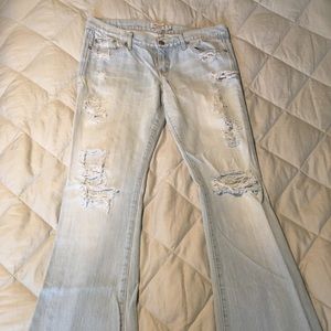 Distressed flared jeans